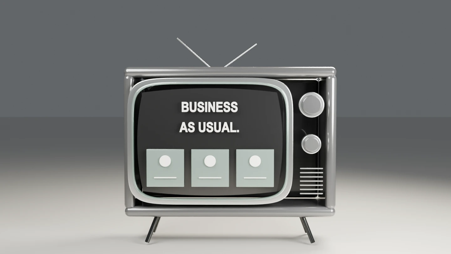 Monochrome television displaying Business as usual and three identical cards